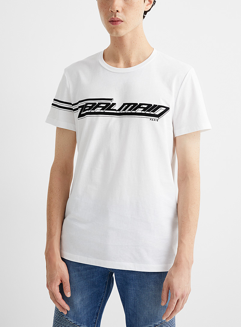 Balmain: Le t-shirt signature dynamique Blanc à motifs pour homme