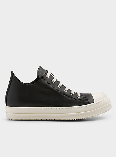 Le sneaker bas en cuir noir et blanc Homme