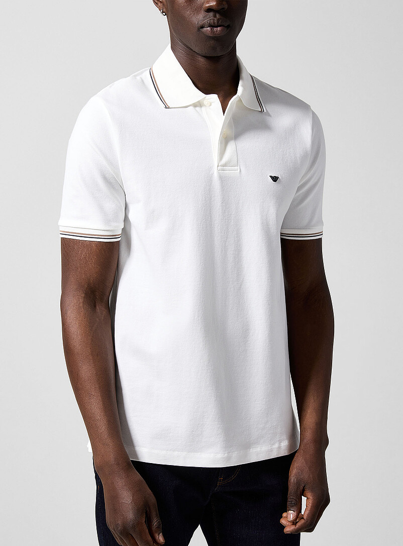 Emporio Armani: Le polo bordures ray&eacute;es Bleu marine - Bleu nuit pour homme