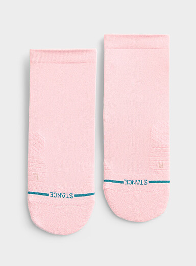 La chaussette de course rose p&acirc;le