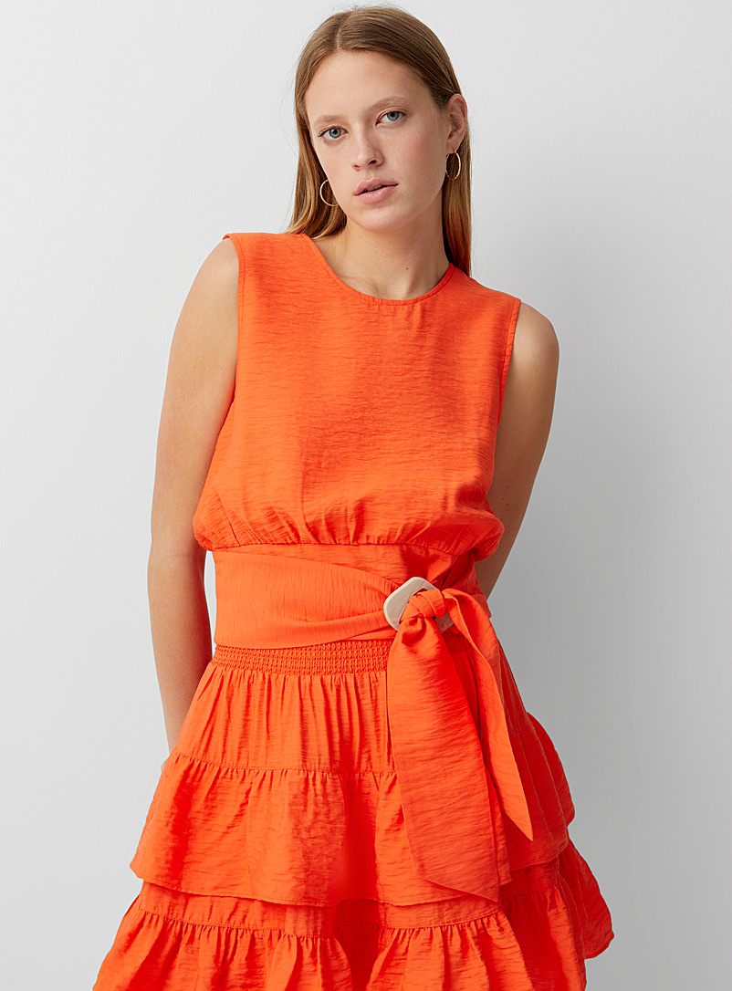 Icône Coral Sleeveless belted blouse for women