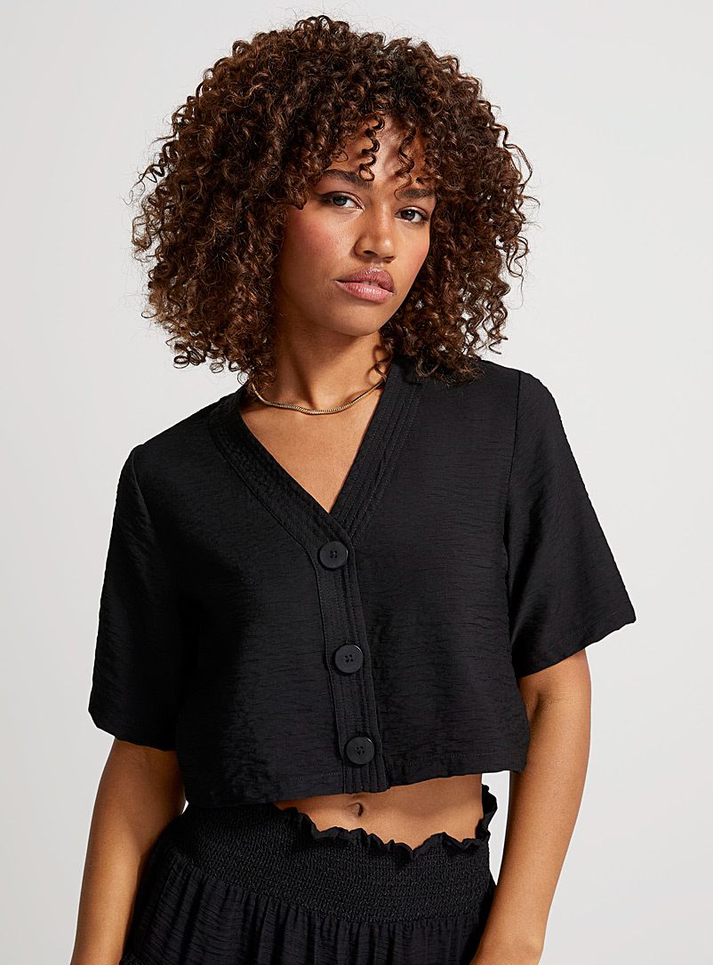Icône Black Cropped and loose V-neck blouse for women