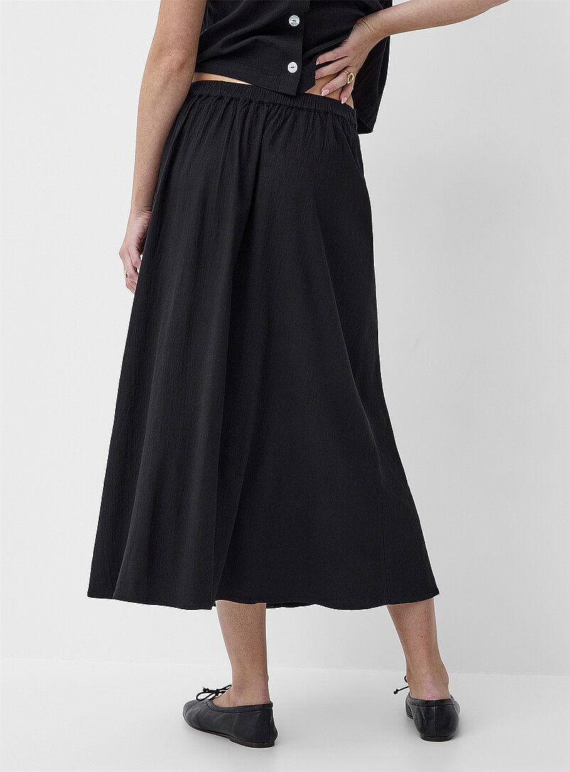 Ic&ocirc;ne: La jupe midi boutonn&eacute;e Noir pour femme