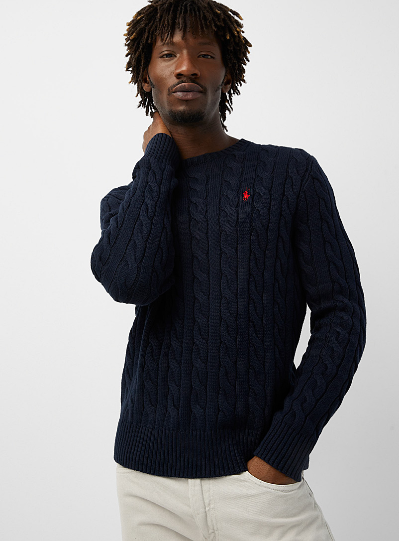 Embroidered rider twisted-cable sweater