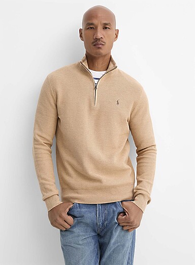 Le chandail col zipp&eacute; tricot alv&eacute;ole