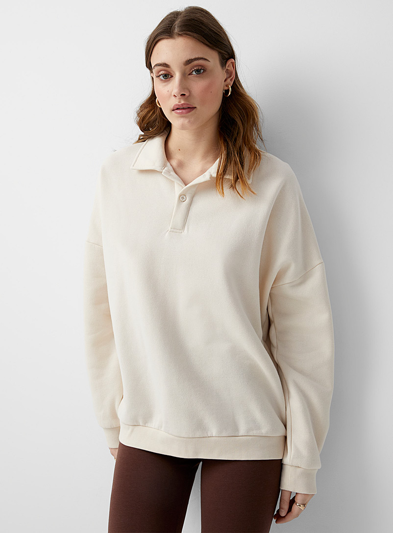 Twik Ivory White Loose organic cotton fleece polo sweatshirt for women