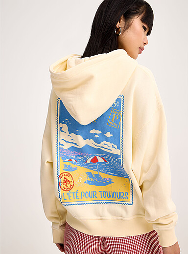 Le sweat ample &agrave; capuche imprim&eacute; dos