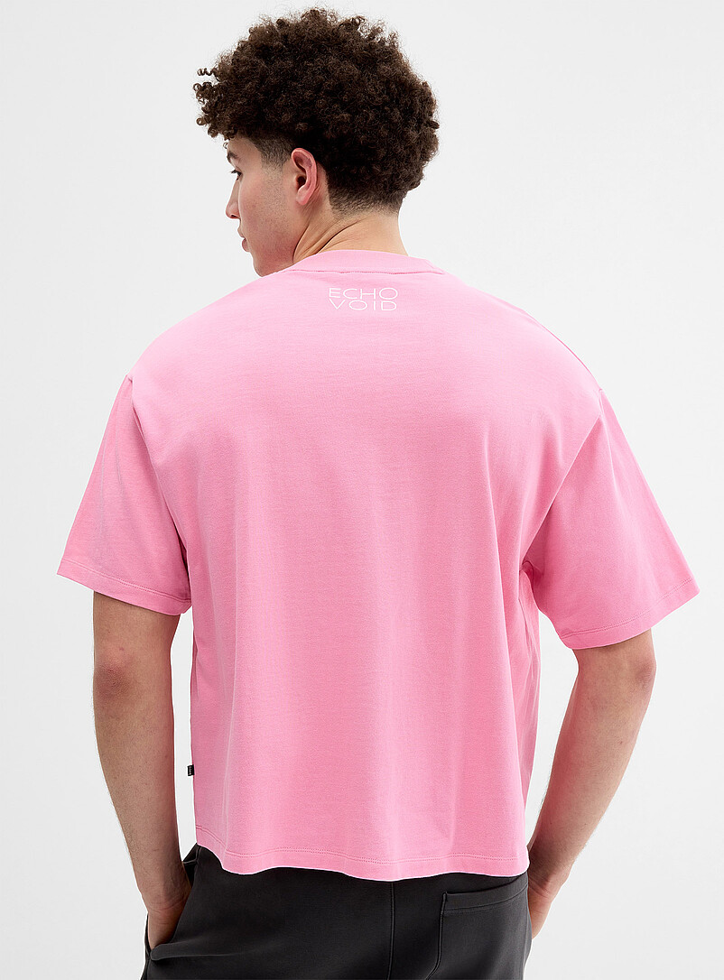 Djab: Le t-shirt graphique humano&iuml;de <b>Coupe ample</b> Rose pour homme
