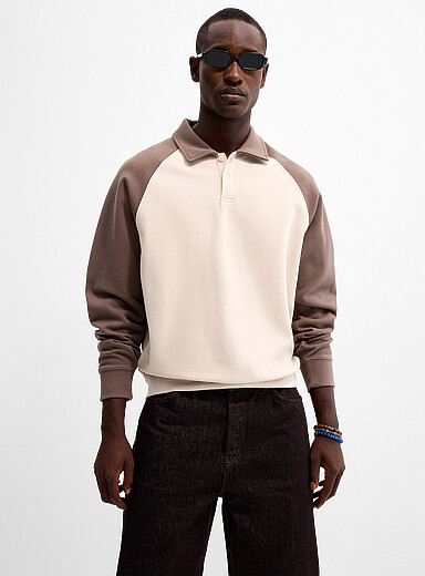 Contrasting raglan sleeve polo