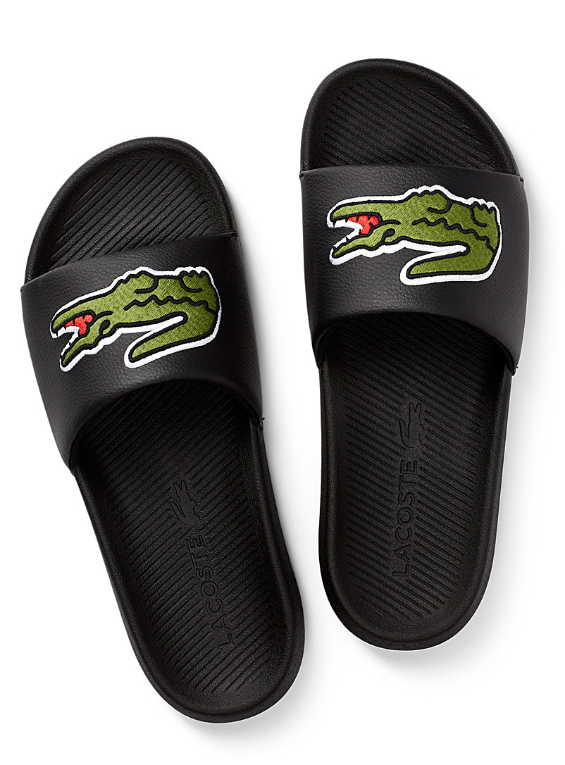 Lacoste: La sandale slide noire croco Homme Noir pour homme