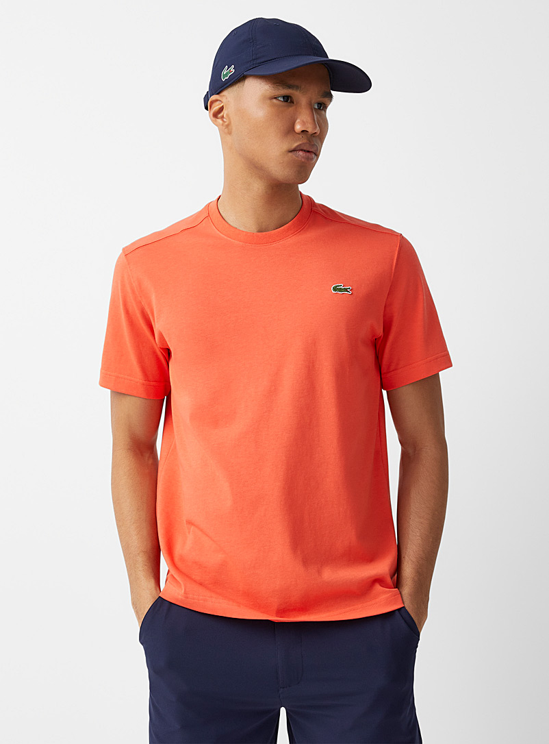 Lacoste: Le t-shirt uni écusson croco Orange pour homme