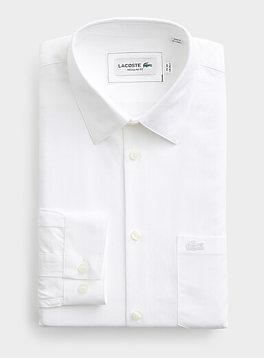 Lacoste: La chemise Dobby blanche <b>Coupe r&eacute;guli&egrave;re</b> Blanc pour homme
