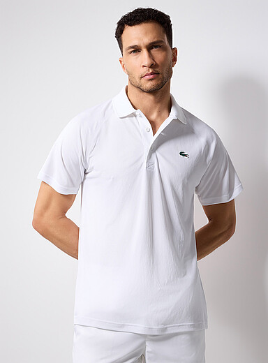 Le polo de tennis jersey piqu&eacute; interlock