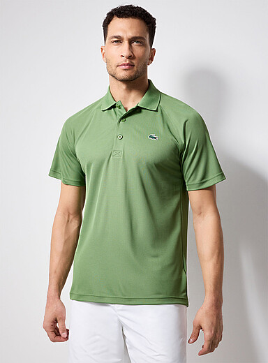 Le polo de tennis jersey piqu&eacute; interlock