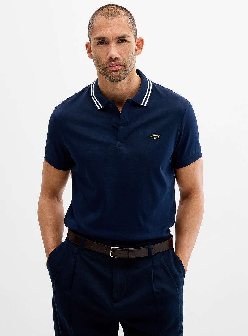 Lacoste: Le polo jersey col ray&eacute; exclusif <b>Coupe r&eacute;guli&egrave;re</b> Vert pour homme