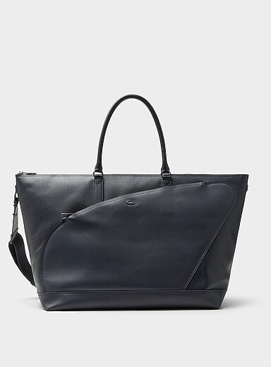 Asymmetric pocket travel bag