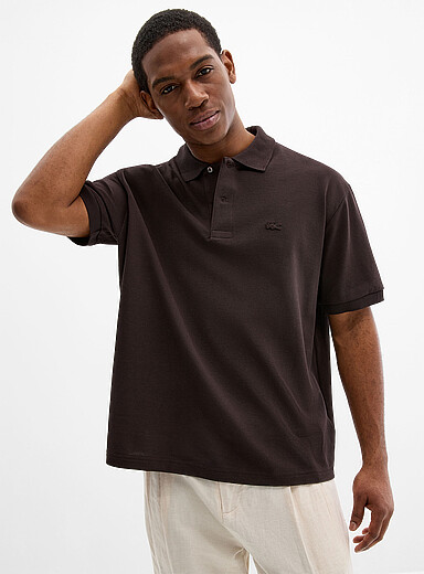 Lacoste: Le polo piqu&eacute; chocolat <b>Coupe ample</b> Brun pour homme