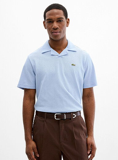 Lacoste: Le polo col Johnny maille piqu&eacute;e <b>Coupe classique</b> Bleu p&acirc;le - Bleu ciel pour homme