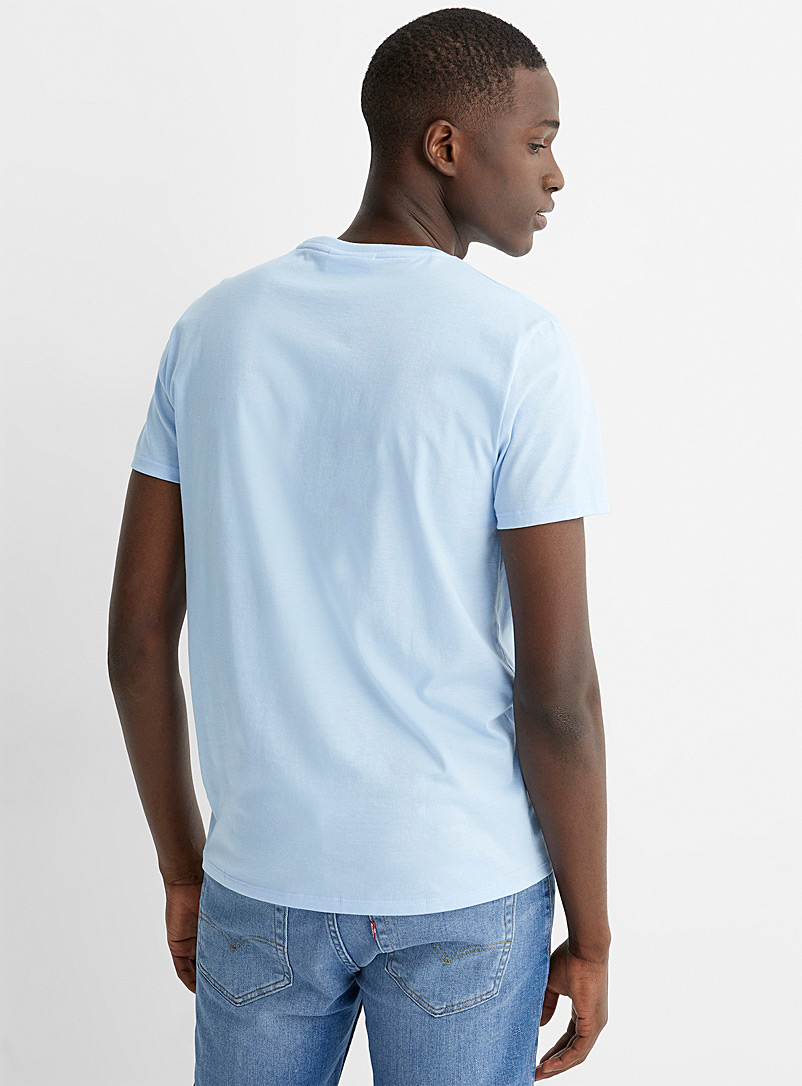 lacoste blue and white t shirt