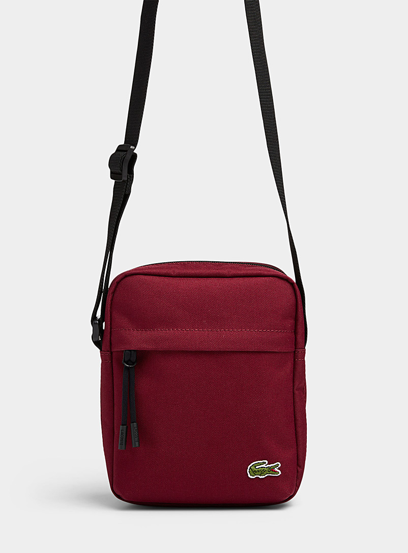 Lacoste: Le sac bandoulière Neocroc Rouge moyen-framboi-ceris pour homme