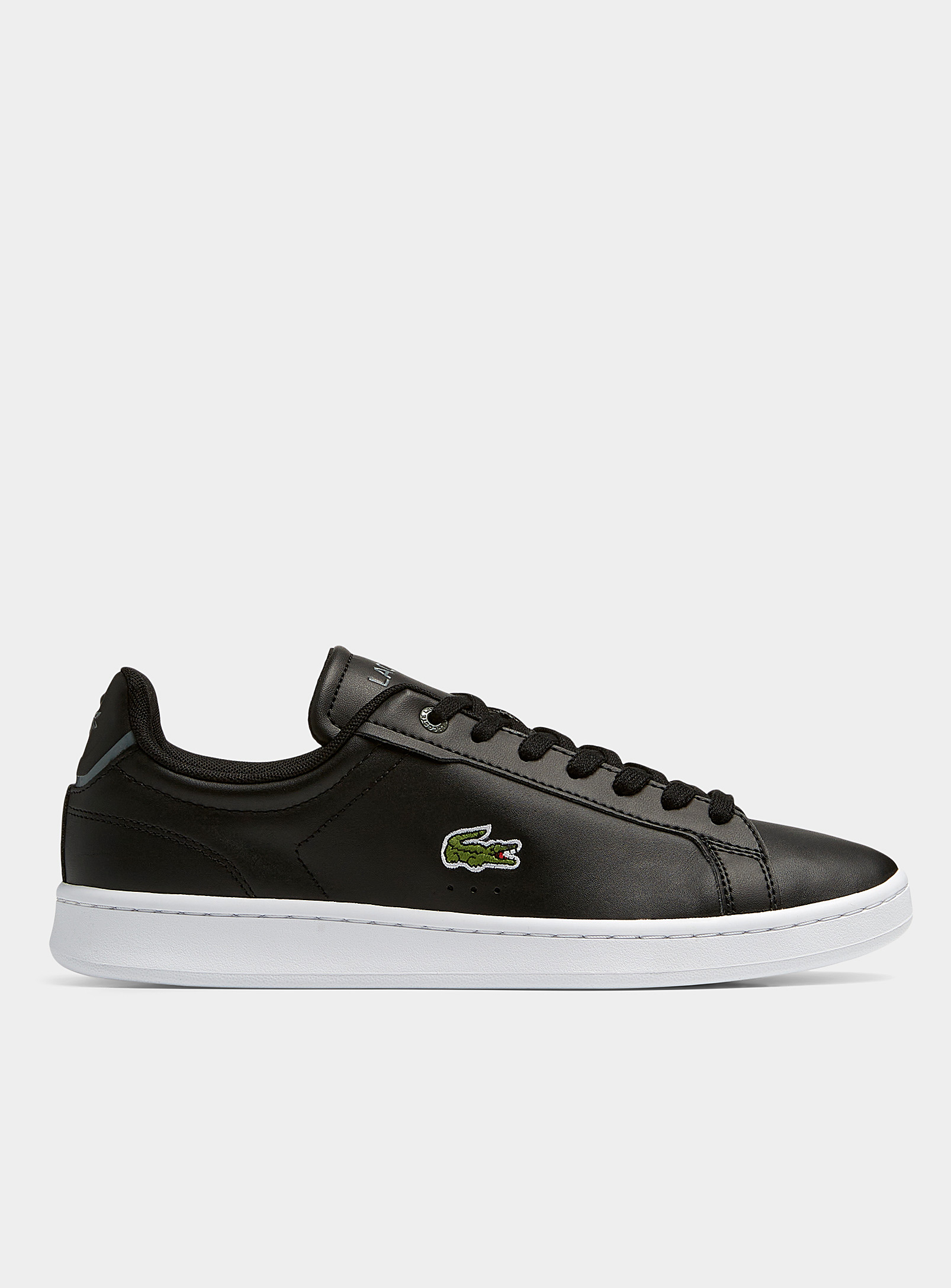 Shop Lacoste Carnaby Pro Court Sneakers Men In Black