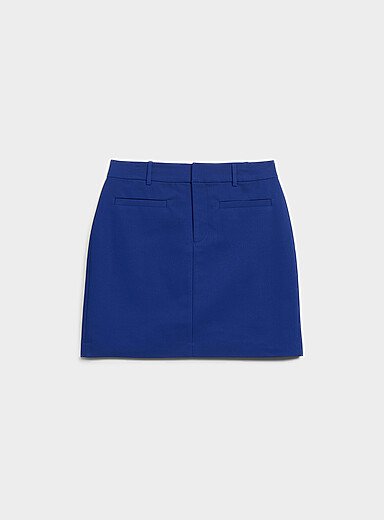 La jupe-short structur&eacute;e poches passepoil&eacute;es