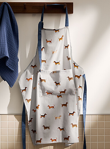 Le tablier chiens joyeux