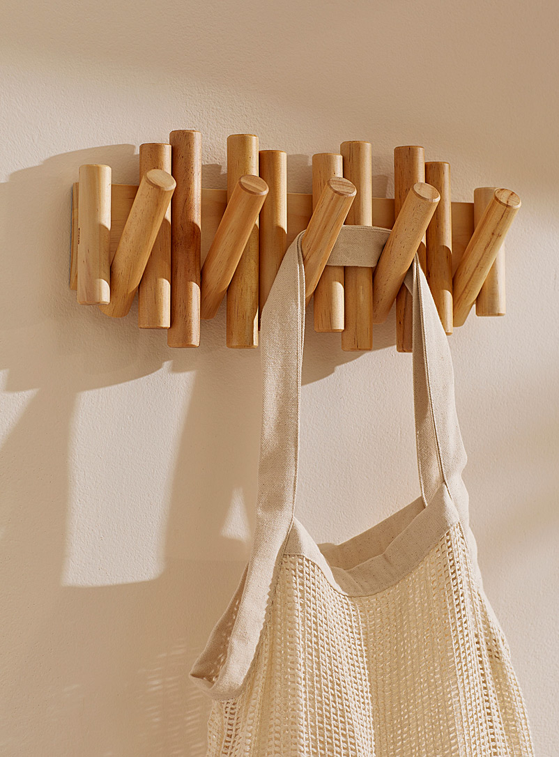 https://imagescdn.simons.ca/images/9955-4222000-98-A1_2/wall-mounted-hanger-with-five-cylindrical-hooks.jpg?__=6