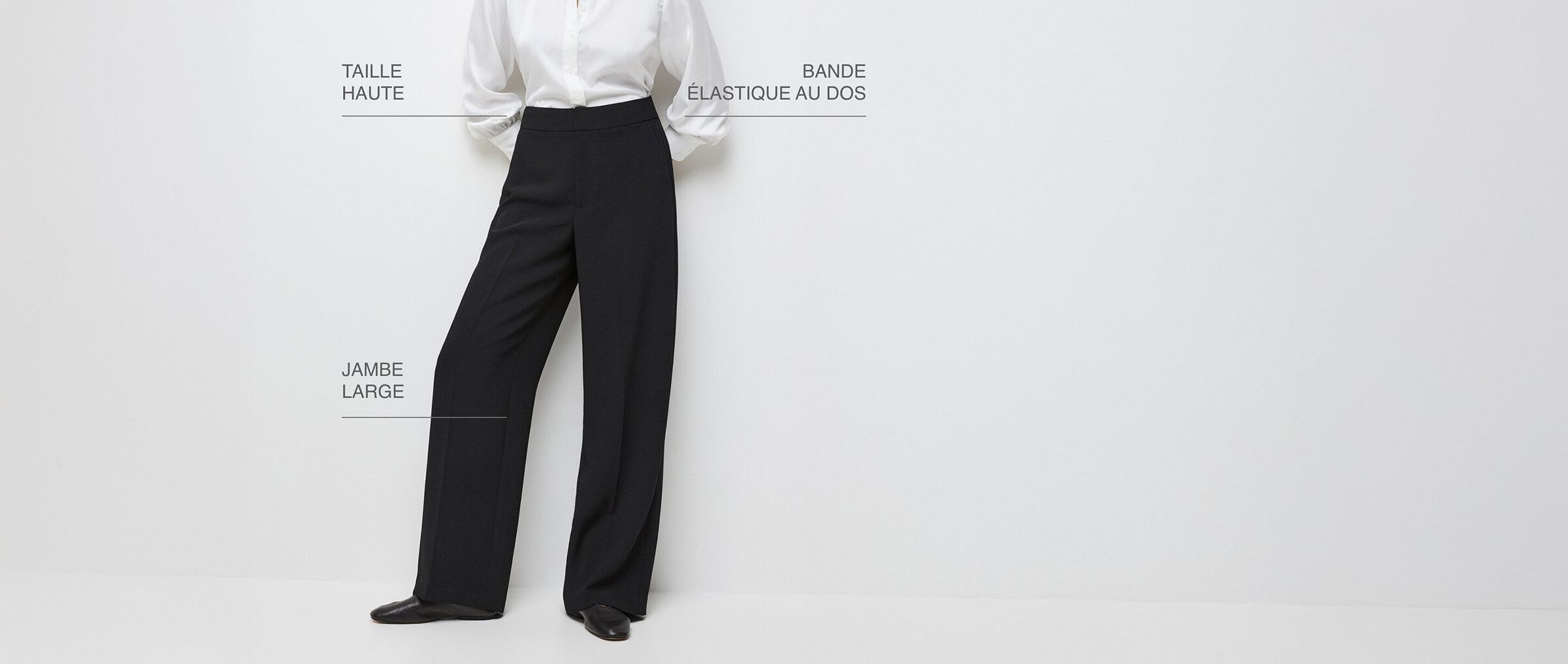 Taille haute, bande élastique au dos, jambe large