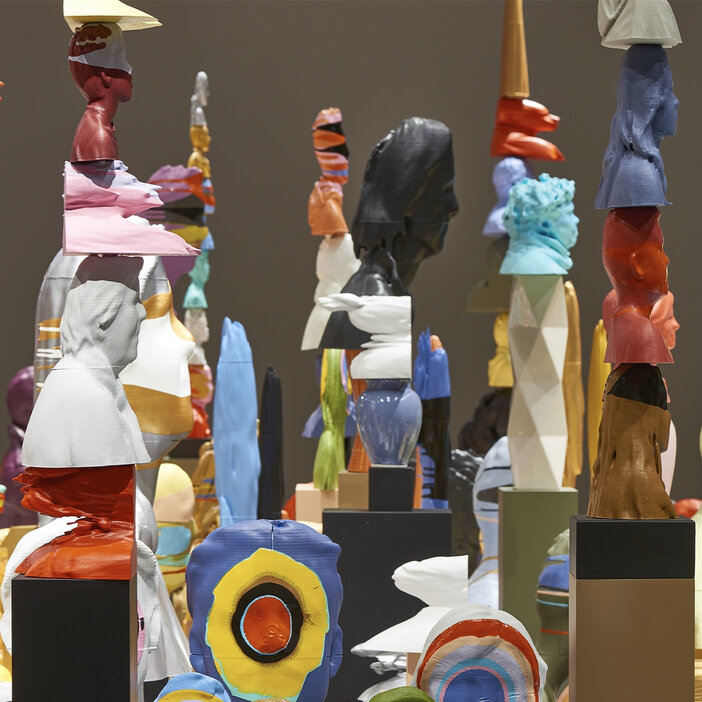 Close-up side view of the artwork "The National Portrait" by Douglas Coupland.