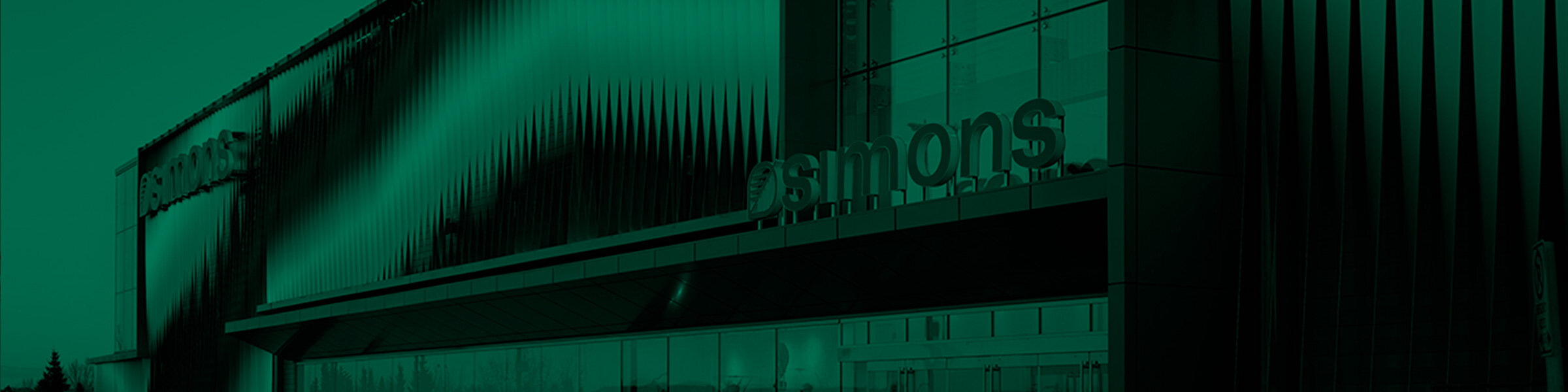 Green background with a photo of a Simons store
