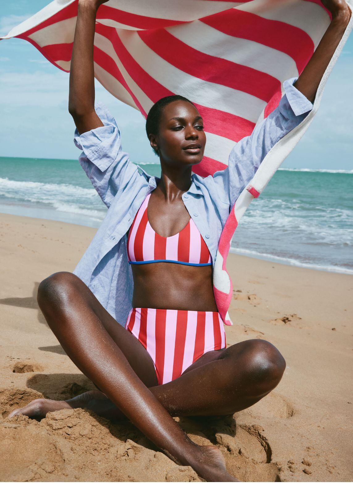 Red and pink striped two-piece swimsuit