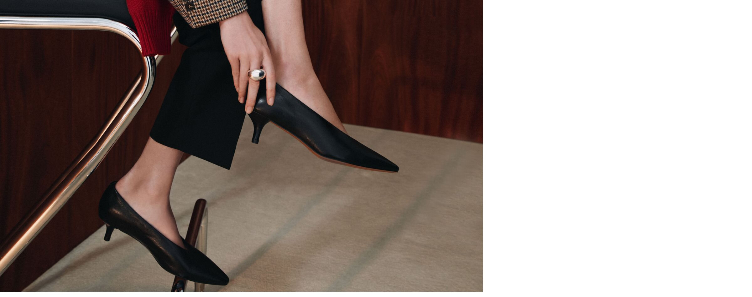 Black leather kitten-heel pumps