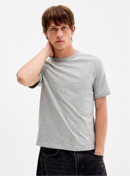 Young man wearing a gray T-shirt