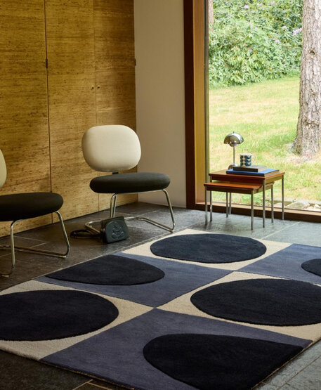 Natural-colored rug with floral motifs