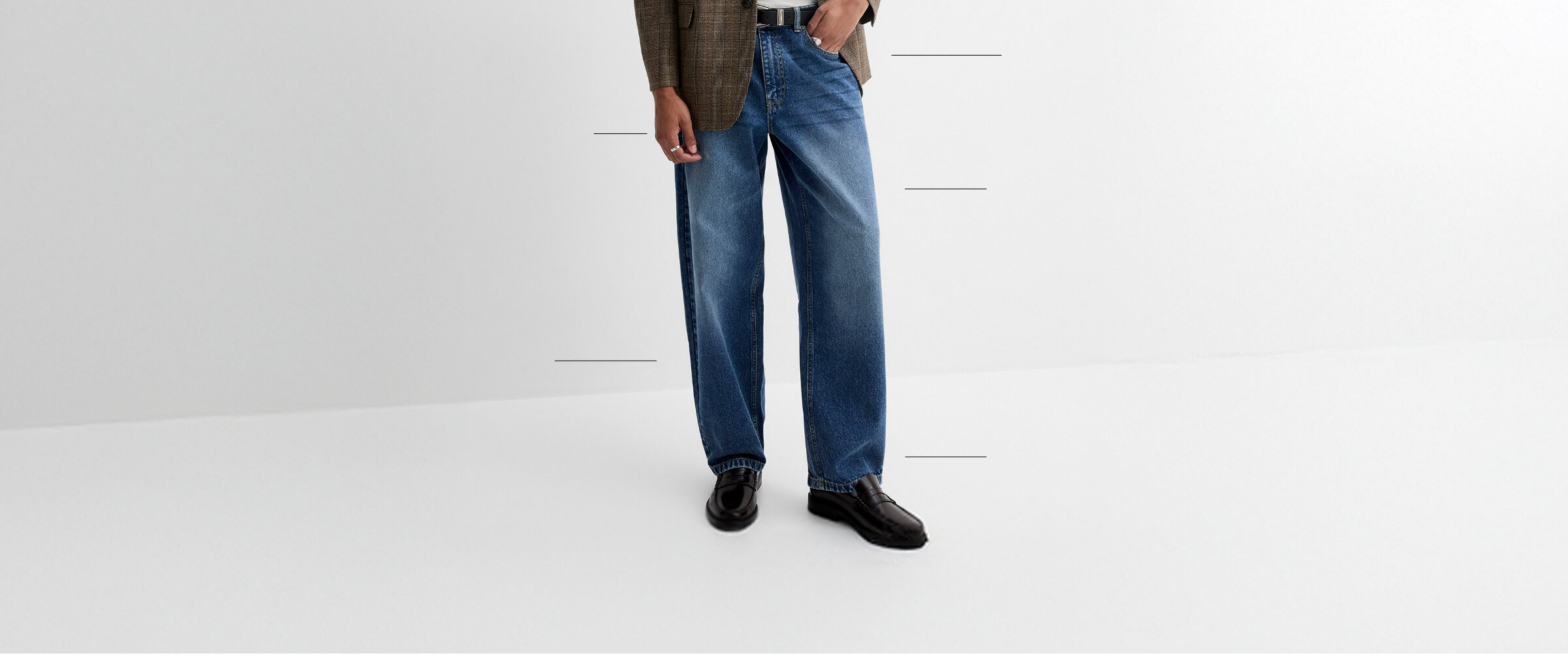 Low waist, drop crotch, loose hip and thigh, and wide, slightly tapered leg