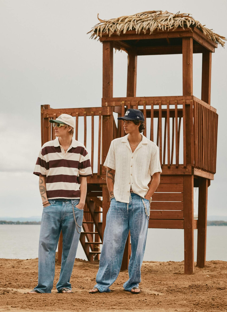 Two young men in a beach setting