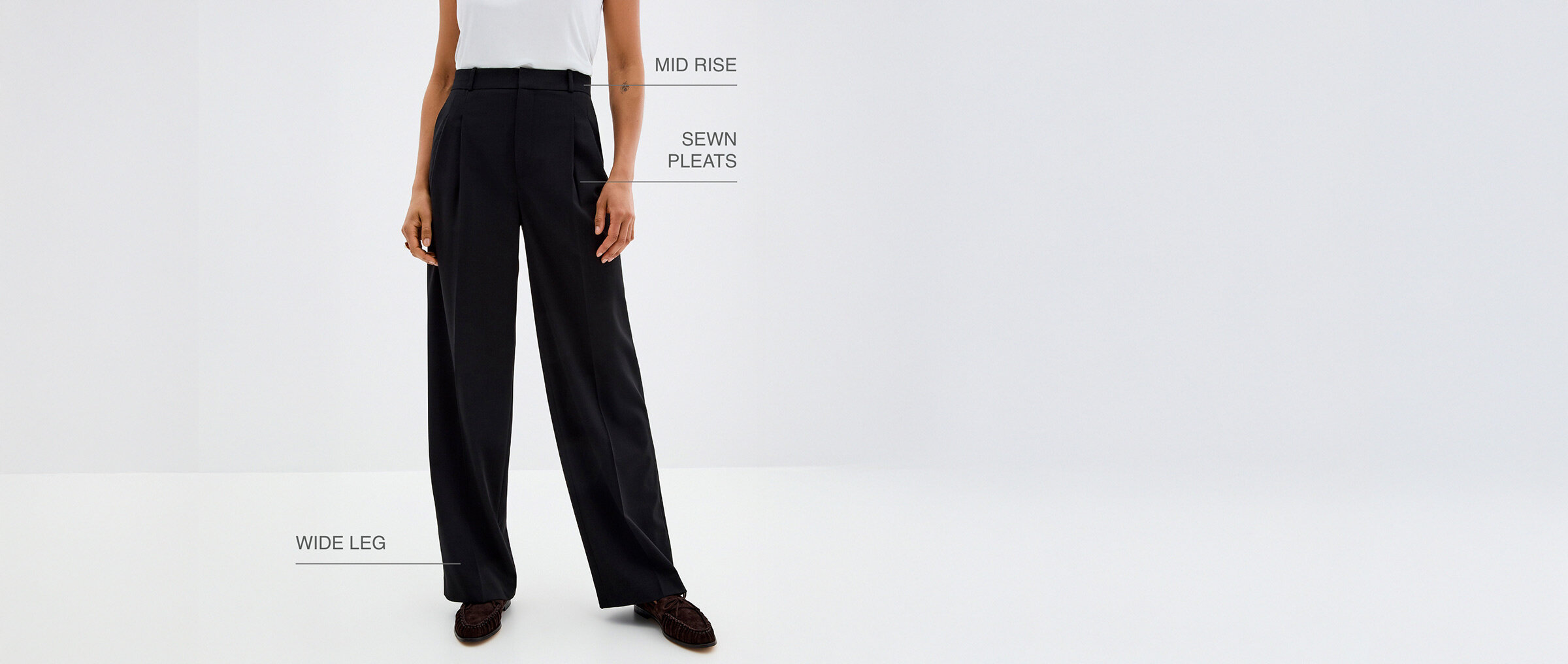Mid rise, sewn pleats, wide leg