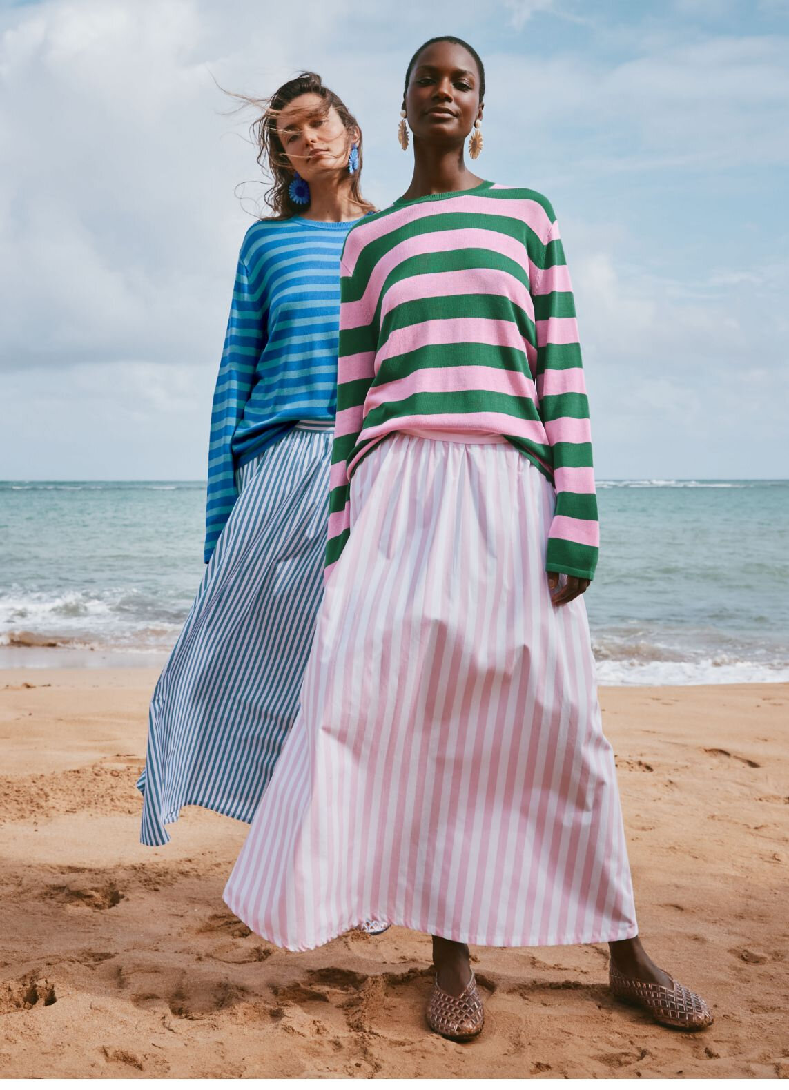 two looks: a horizontally striped sweater and a vertically striped maxi skirt