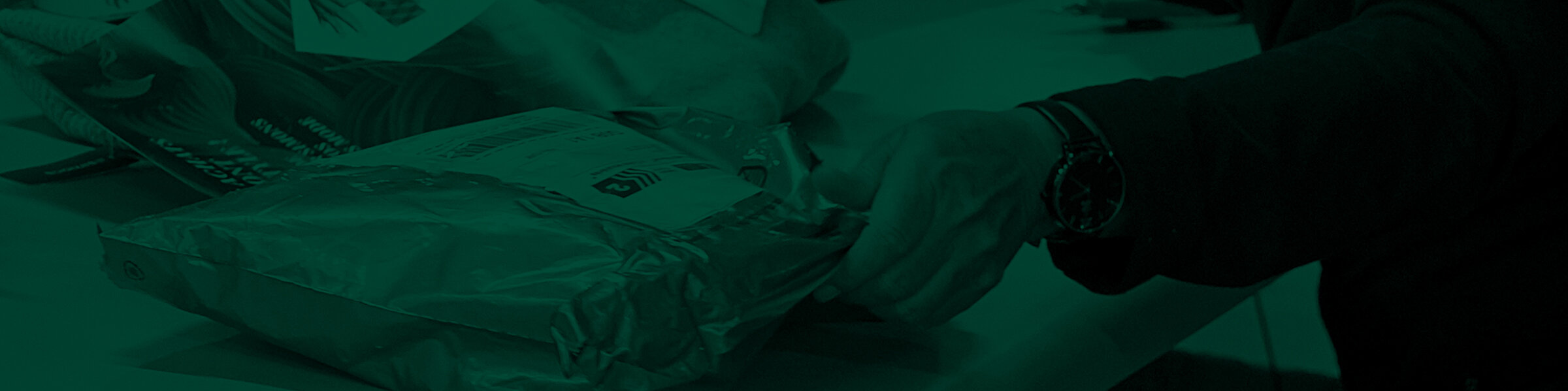Hands handling a package