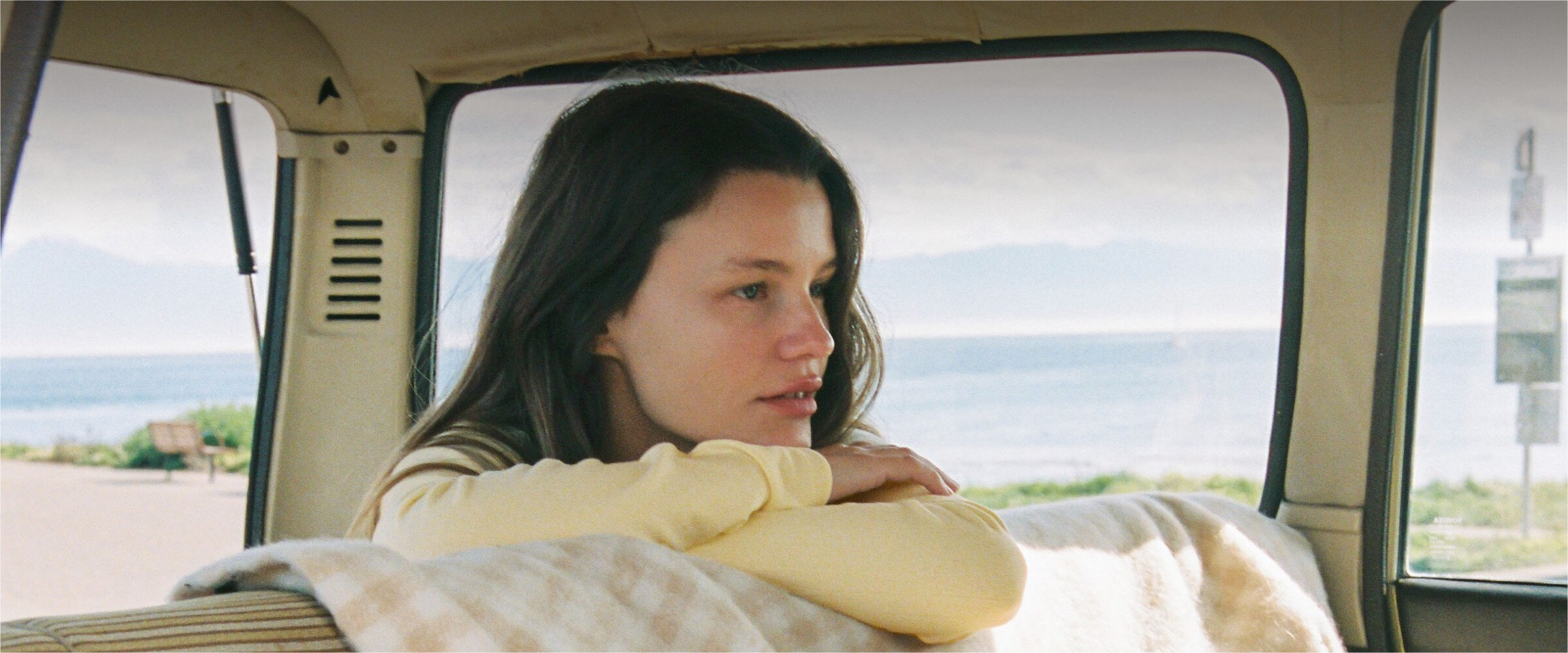 Woman wearing a yellow cardigan