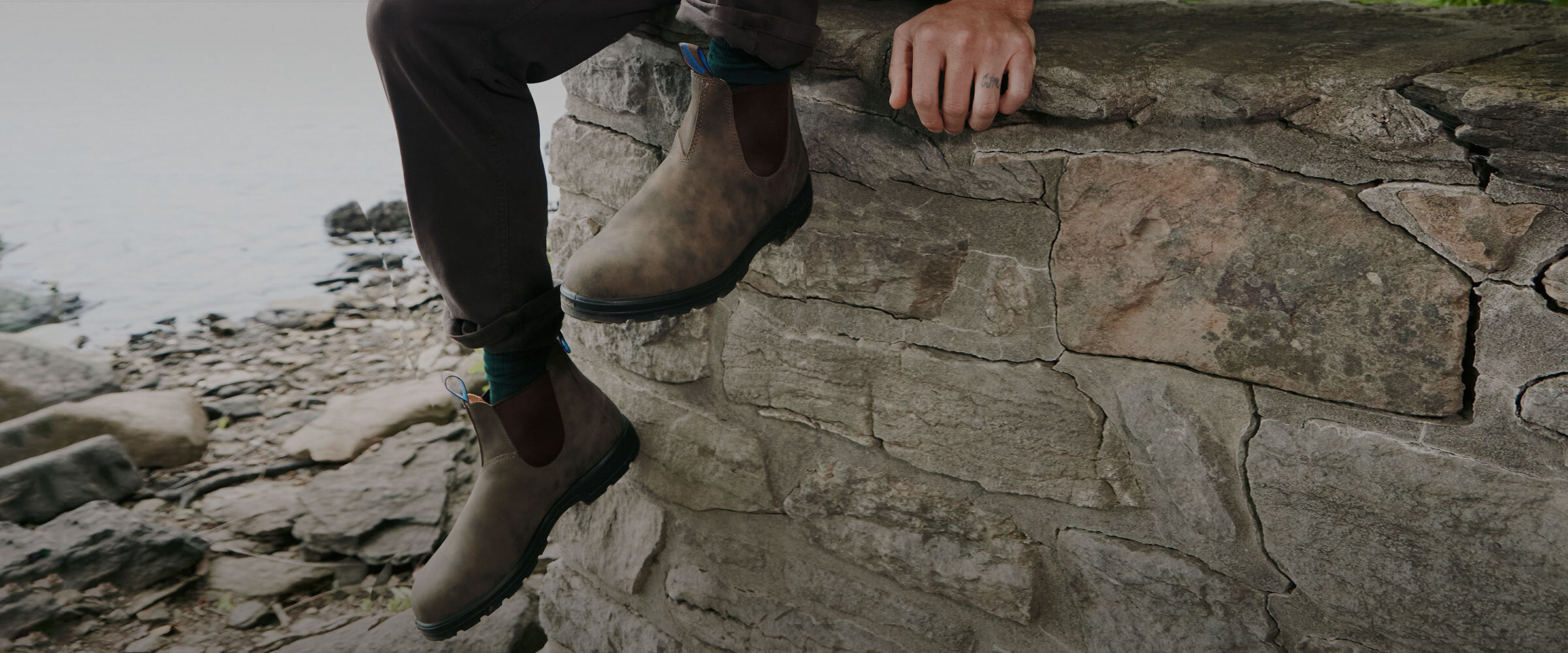A man wearing Blundstone boots