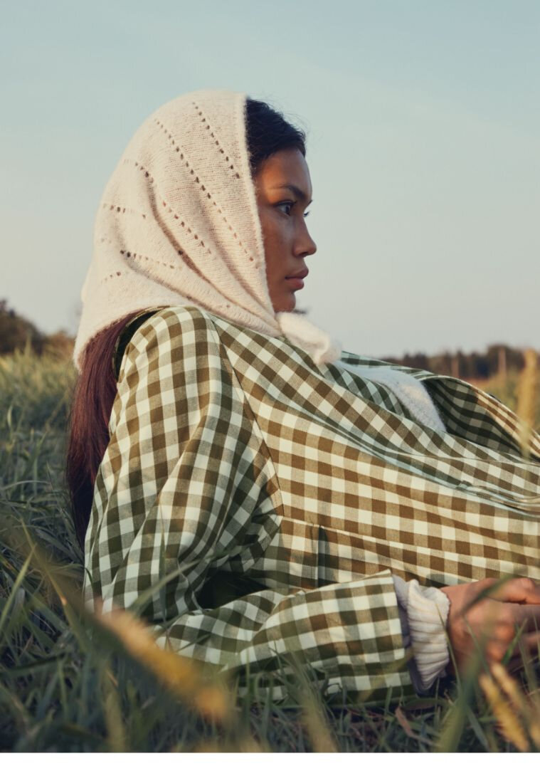 Woman with a scarf over her head