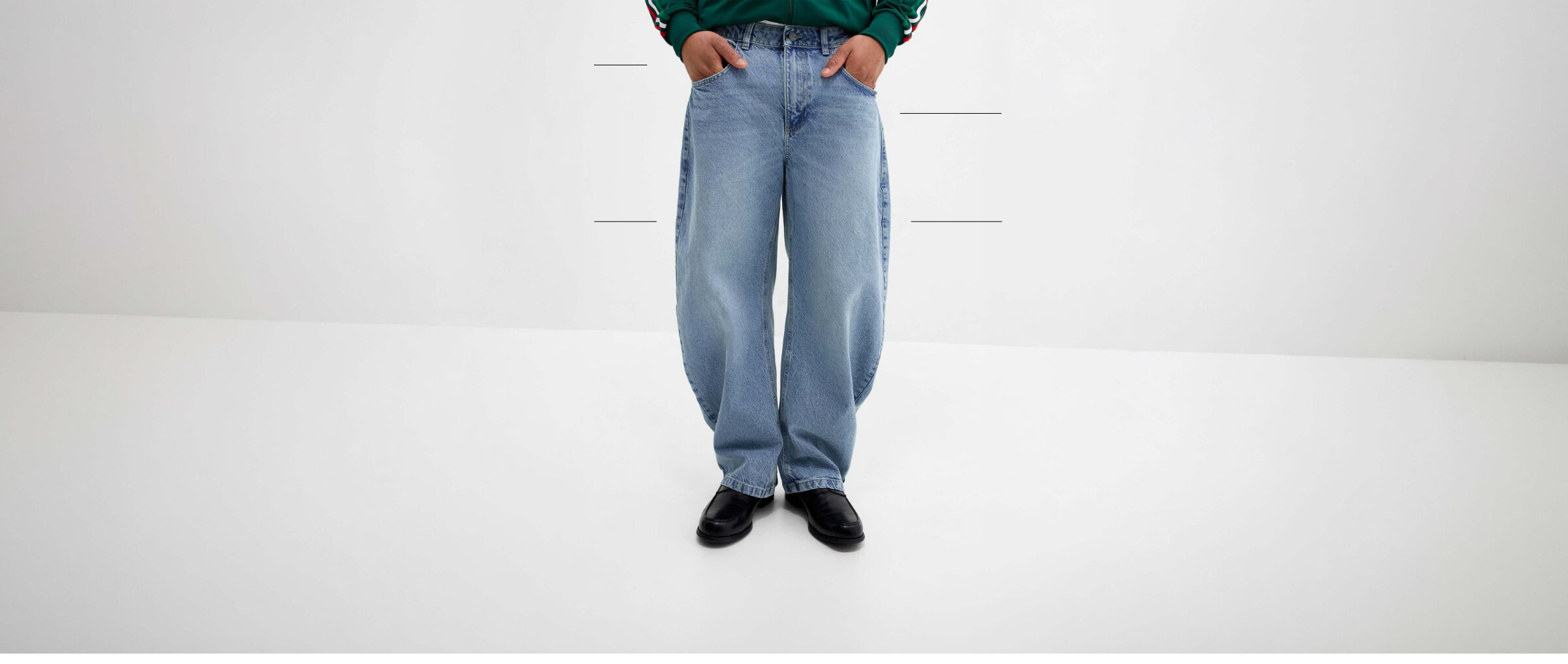 Low waist, drop crotch, loose hip and thigh, and wide, slightly tapered leg